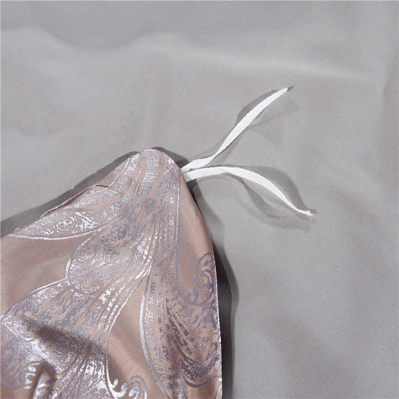 Parure de lit 4 pièces en jacquard satiné – Luxe, confort & élégance