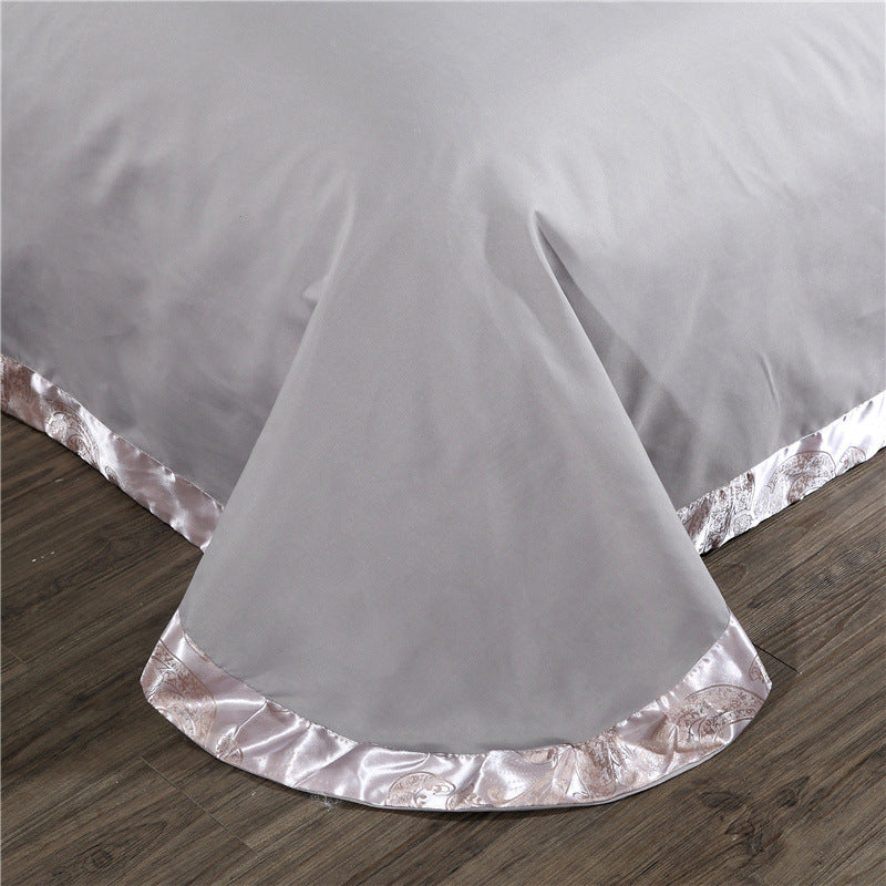 Parure de lit 4 pièces en jacquard satiné – Luxe, confort & élégance